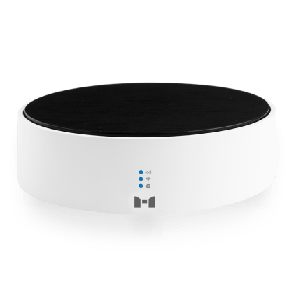 A sleek white MTronic MHub, with a flat black top and a grey MTronic logo